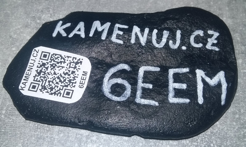 Painted traveling stone with QR code